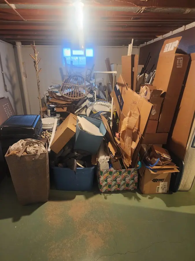 Roll-off dumpster container at job site for 2 Yard Dumpster Rental in Childersburg